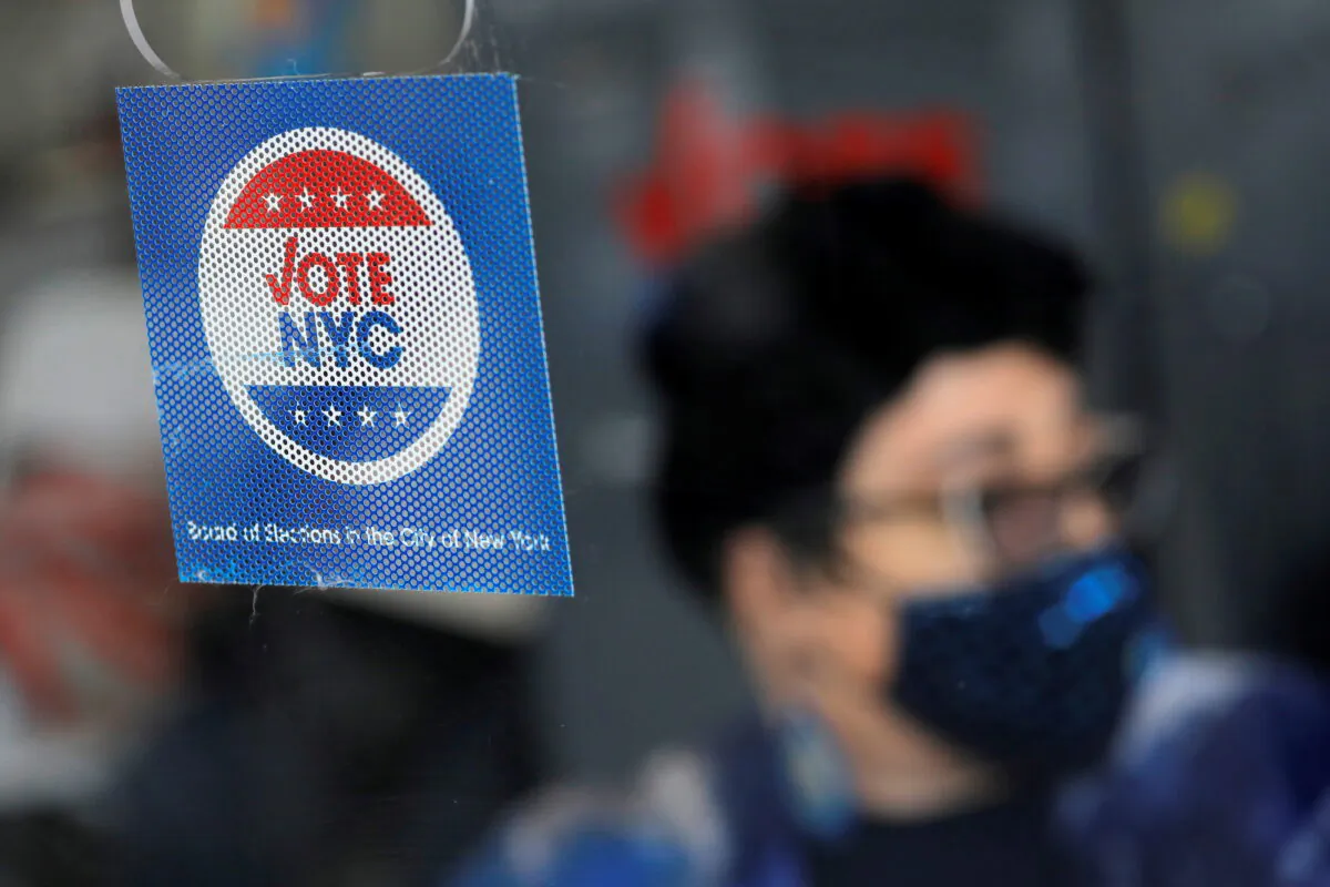 Signage at an early voting location ahead of New York's mayoral election in Harlem on June 18, 2021. (Reuters/Andrew Kelly)