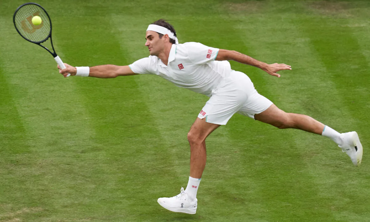 Roger Federer of Switzerland during the Men's Singles First Round match during Day Two of The Championships-Wimbledon 2021 at the All England Lawn Tennis and Croquet Club in London, England, on June 29, 2021. (Peter Van den Berg/USA TODAY Sports via Reuters)