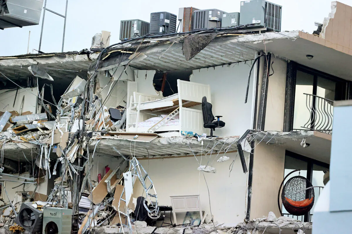 A bunk bed is seen in the rubble at Champlain Towers South Condo in Surfside, located at 8777 Collins Avenue, a part of which collapsed in the early morning in Surfside, Fla., on June 24, 2021. (David Santiago/Miami Herald/TNS)