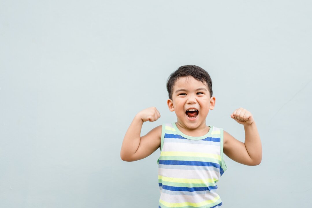 Even if a child with COVID-19 had mild or no symptoms, research finds they still gain strong antibodies that can protect them against re-infection. (MIA Studio/Shutterstock)