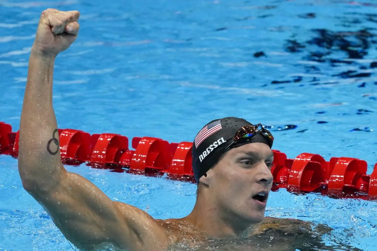 Caeleb Dressel, of United States, celebrates winning the gold medal the men's 50-meter freestyle final at the 2020 Summer Olympics in Tokyo, Japan, on Aug. 1, 2021. (Jae C. Hong/AP Photo)