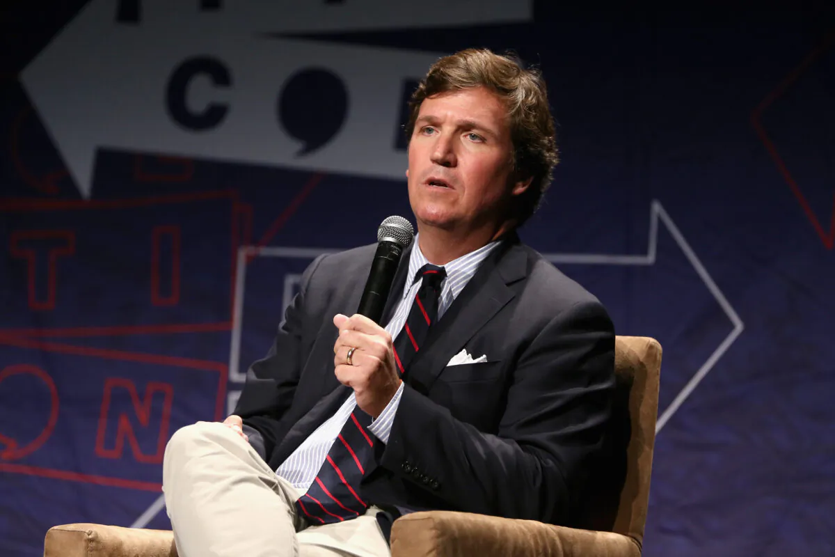 Fox News host Tucker Carlson speaks onstage during Politicon 2018 at Los Angeles Convention Center on Oct. 21, 2018. (Rich Polk/Getty Images for Politicon)