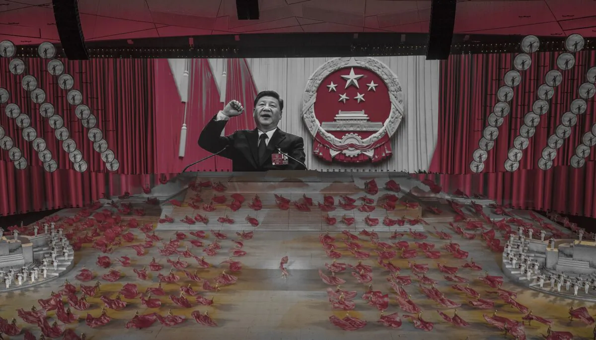Chinese leader Xi Jinping appears on a large screen as performers dance during a mass gala marking the 100th anniversary of the Communist Party at the Olympic Bird's Nest stadium in Beijing, China on June 28, 2021. (Kevin Frayer/Getty Images)
