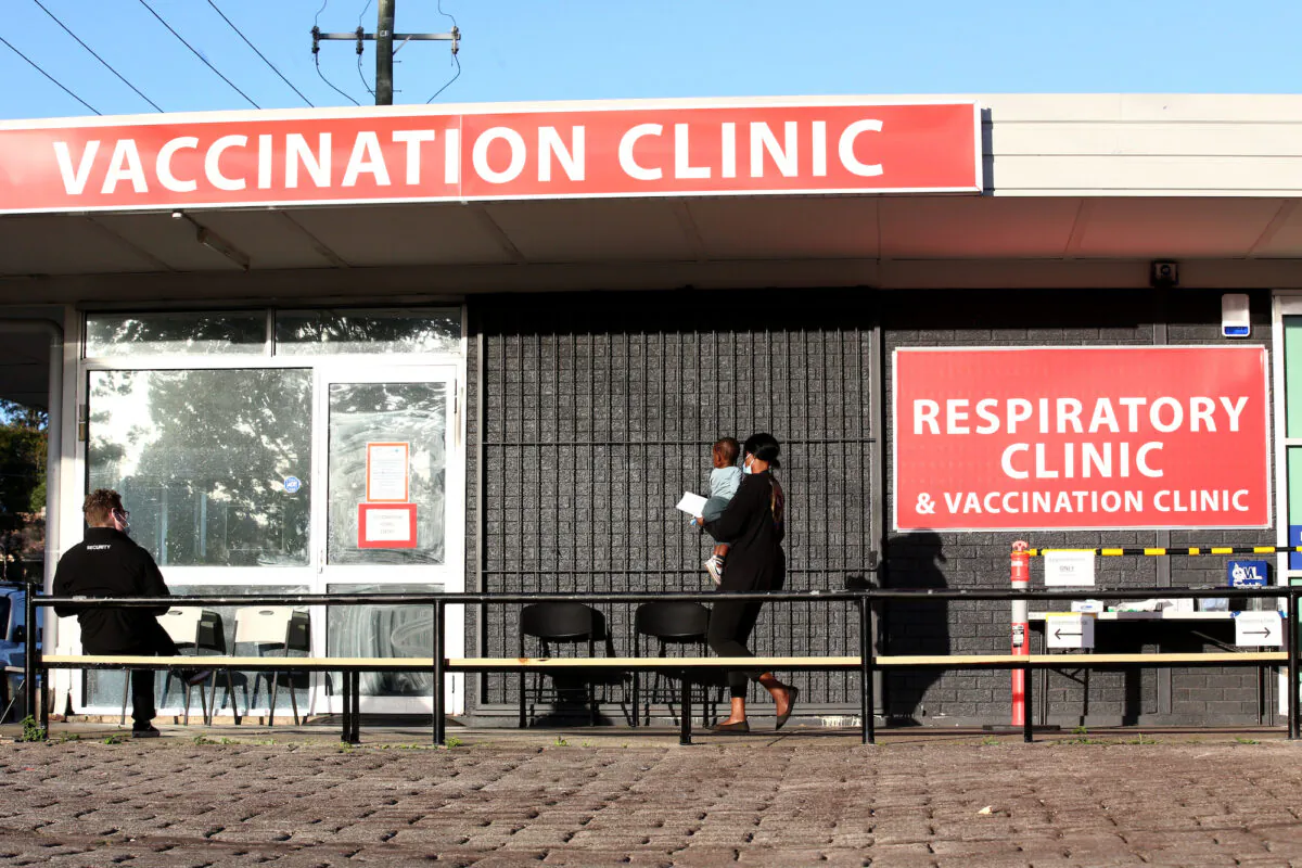 People stand outside a vaccination clinic at Slacks Creek in Brisbane, Australia on June 29, 2021. (Jono Searle/Getty Images)