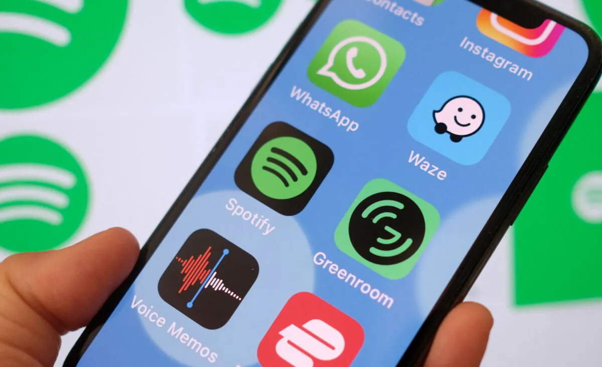 This illustration photo shows the logo of Spotify's Greenroom live audio app on a smartphone in Los Angeles on June 16, 2021. (Chris Delmas/AFP via Getty Images)