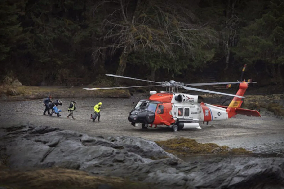 A U.S. Coast Guard helicopter sits in a beach area in this file photo taken, on March 28, 2020. (Dustin Safranek/Ketchikan Daily News/Associated Press)