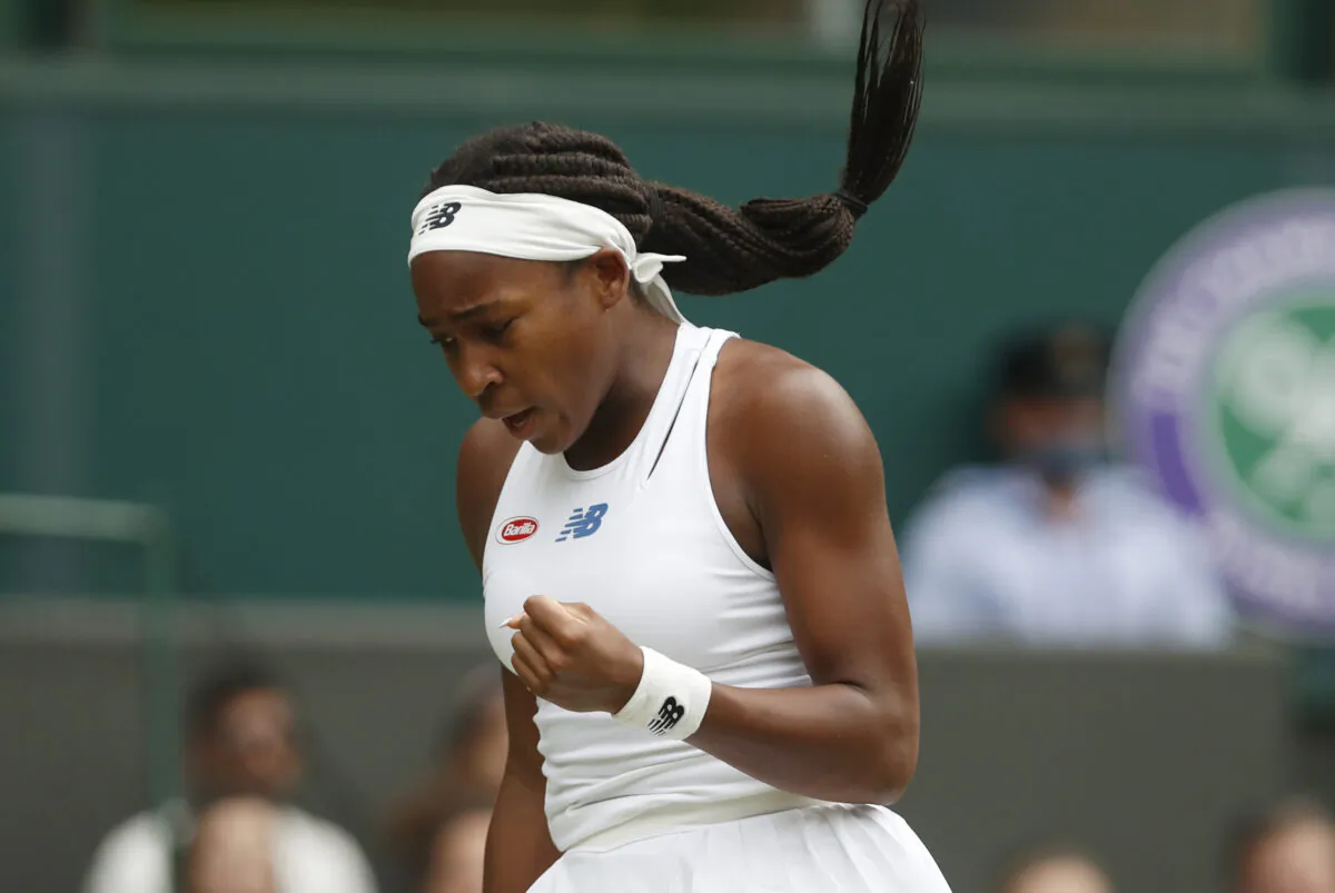 Coco Gauff of the U.S. celebrates during her second round match against Russia's Elena Vesnina, on the fourth day of the 2021 Wimbledon Championships at The All England Tennis Club in Wimbledon, London, Britain, on July 1, 2021. (Paul Childs/Reuters)