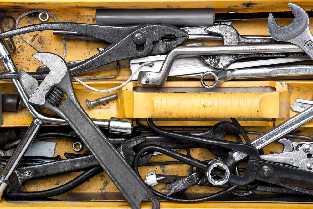 Take stock of your tool collection and consolidate so you don't have an overflowing toolbox. (NA image/Shutterstock)