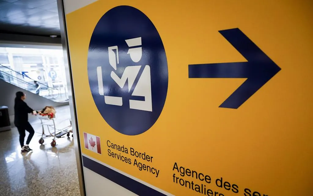 A Canada Border Services Agency (CBSA) sign is seen in Calgary, Alta., on Aug. 1, 2019. (The Canadian Press/Jeff Mcintosh)