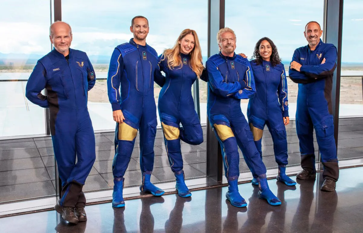 From left: Chief Pilot Dave Mackay, Lead Operations Engineer Colin Bennett, Chief Astronaut Instructor Beth Moses, Founder of Virgin Galactic Richard Branson, Vice President of Government Affairs and Research Operations Sirisha Bandla and pilot Michael Masucci. (Virgin Galactic via AP)