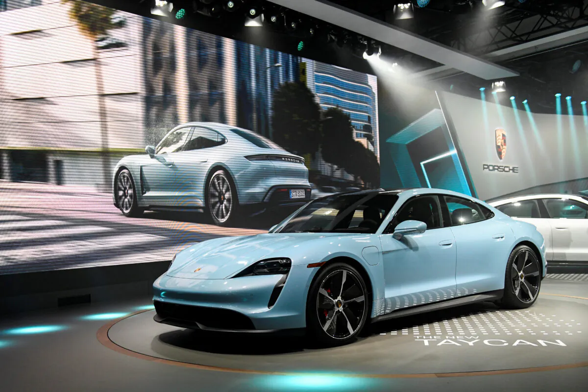 Porsche introduces its new Taycan 4S at the LA Auto Show in Los Angeles, Calif., on Nov. 20, 2019. (Andrew Cullen/Reuters)
