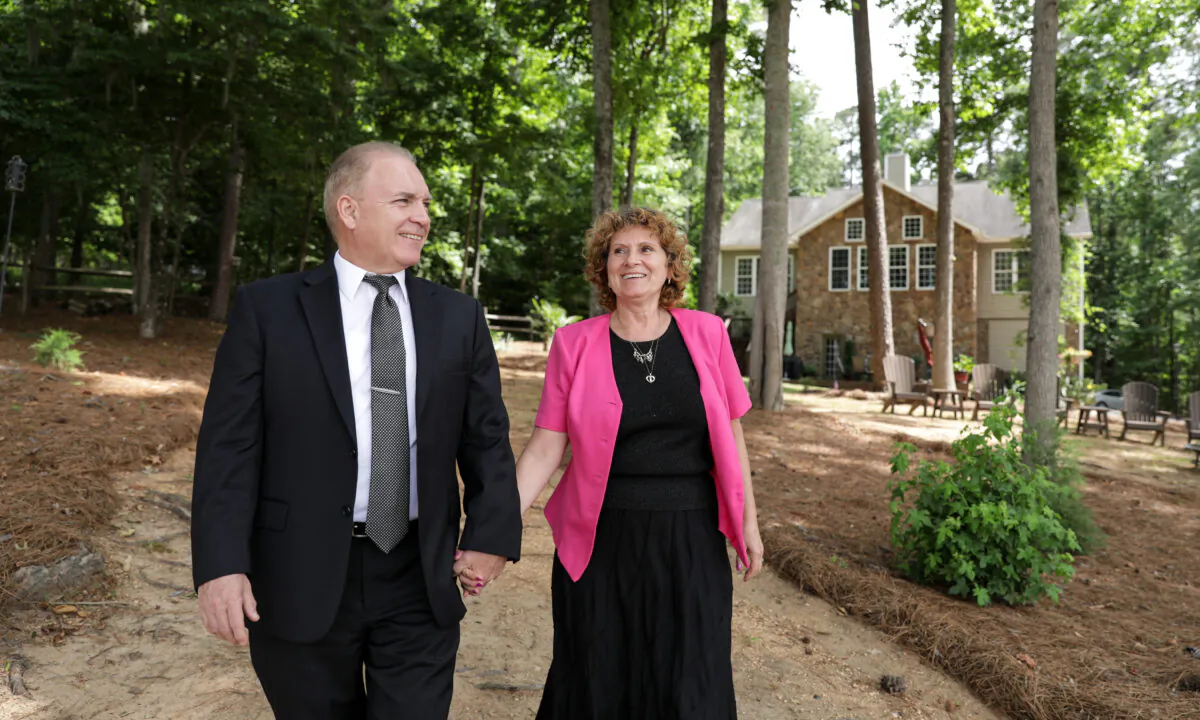 Tiberiu and Sandra Czentye outside their South Carolina home. (Samira Bouaou)