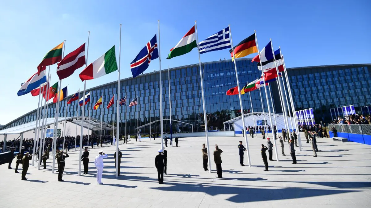Officials and military personnel at the NATO headquarters, in Brussels, on May 25, 2017. (Emmanuel Dunand/AFP via Getty Images)