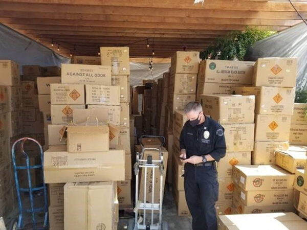 police-shows-boxes-of-fireworks-explosives