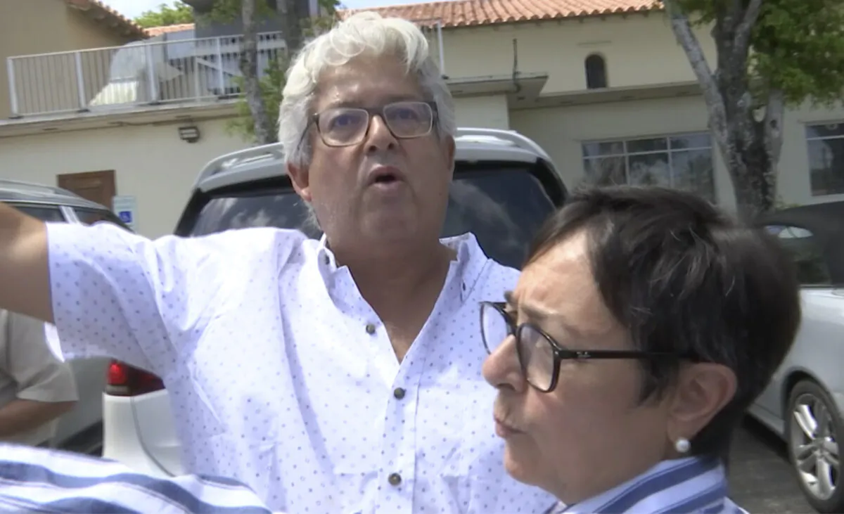 Alfredo Lopez talks about how his family escaped from the Champlain Towers South condo building in Surfside, Fla., on June 27, 2021. (Stacey Plaisance/AP Photo)