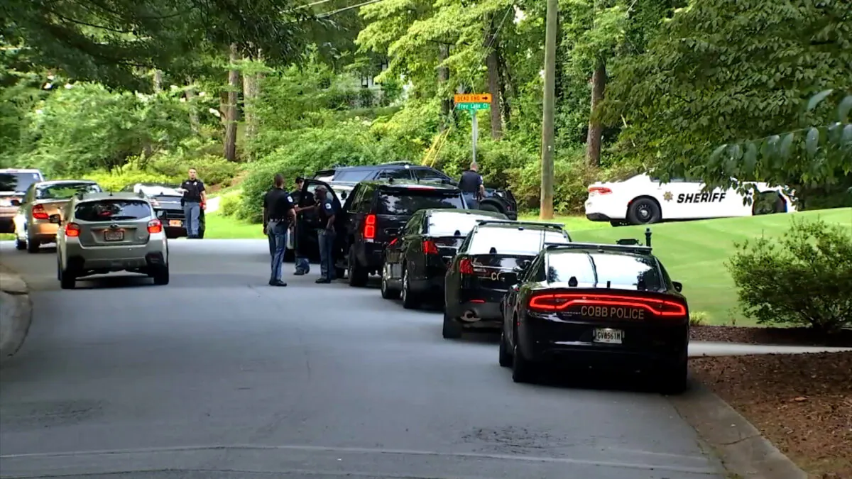 Cobb County police converge on the Pinetree Country Club in Kennesaw, Ga., on July 3, 2021, after the club pro's body was found on the course. (Courtesy of WGCL)