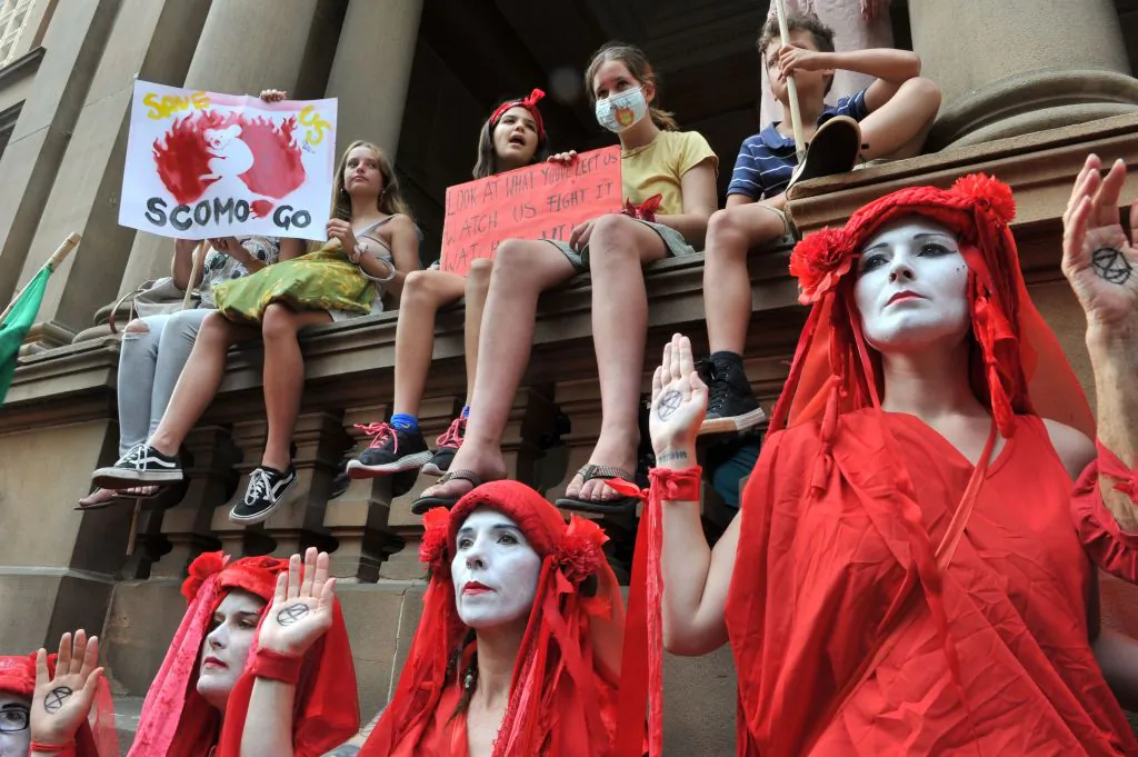 Participants take part in a demonstration demanding the government take immediate action against climate change in Sydney, Australia on January 10, 2020. (Mohammad Farooq/AFP via Getty Images)