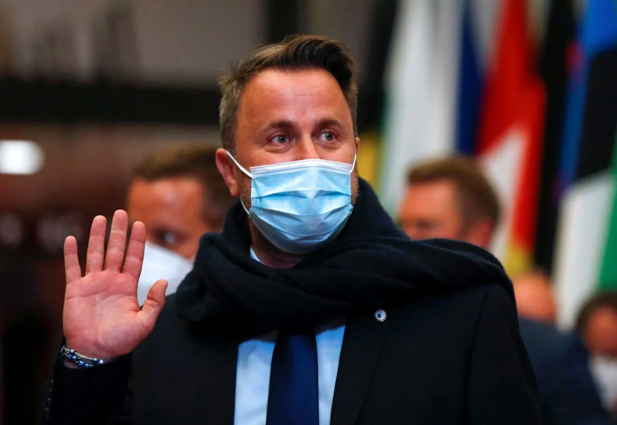 Luxembourg's Prime Minister Xavier Bettel leaves at the end of the first day of an EU summit in Brussels on June 25, 2021.  (Aris Oikonomou/Pool Photo via AP)

