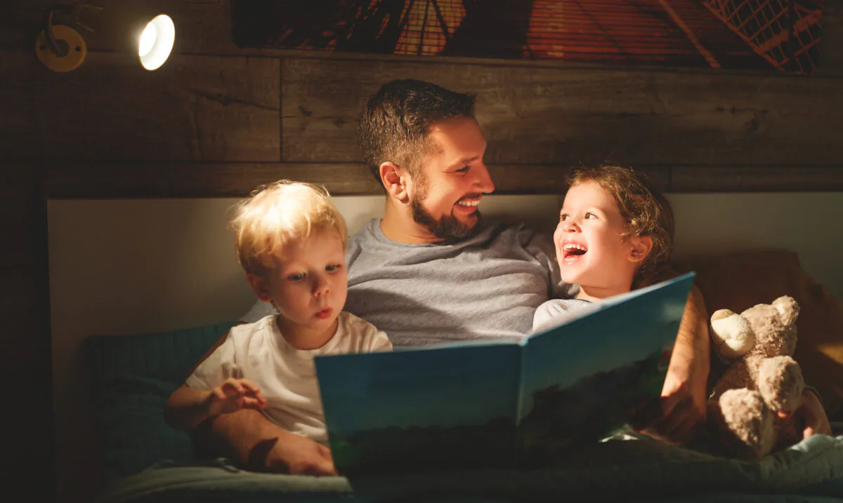 End the day with a bedtime story. It will put a smile on your child's face. (Evgeny Atamanenko/Shutterstock)
