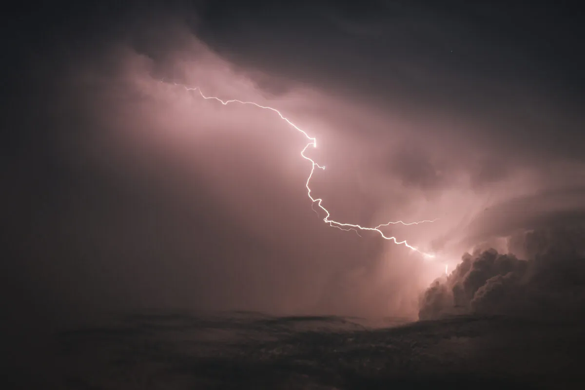 Lightning flashes across the sky in a file photo. (Ole Spata/DPA/AFP via Getty Images)