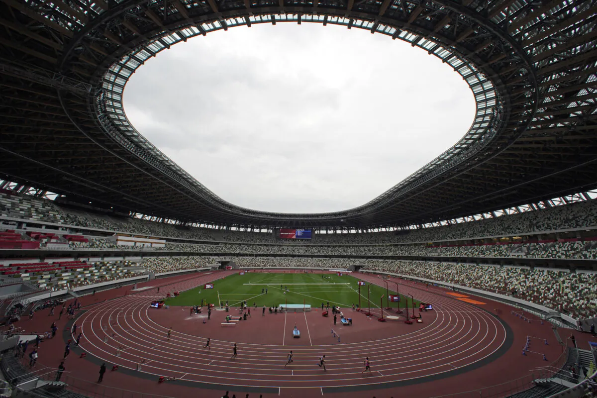 Athletes compete in the men's 400-meter T20 race during an athletics test event for Tokyo 2020 Paralympics Games at National Stadium in Tokyo, on May 11, 2021. (Shuji Kajiyama/AP Photo)