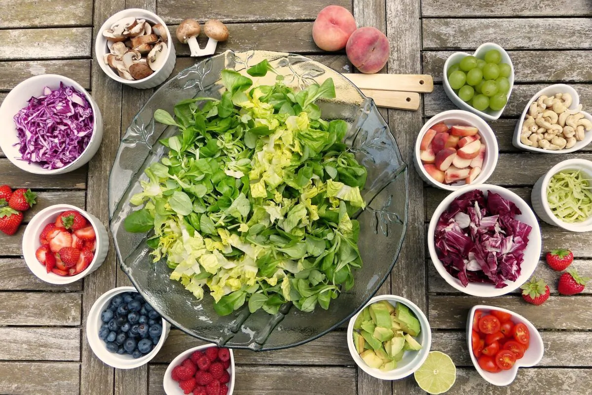 A salad with vegetables, fruits and nuts is seen in this stock photo. (Pixabay)