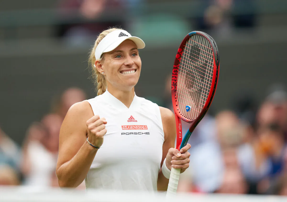 Germany's Angelique Kerber celebrates match point against Czech Republic's Karolina Muchova in the women’s quarter finals at the Wimbledon Tennis Championships in London, on July 6, 2021. (Peter van den Berg/USA TODAY Sports via Reuters)