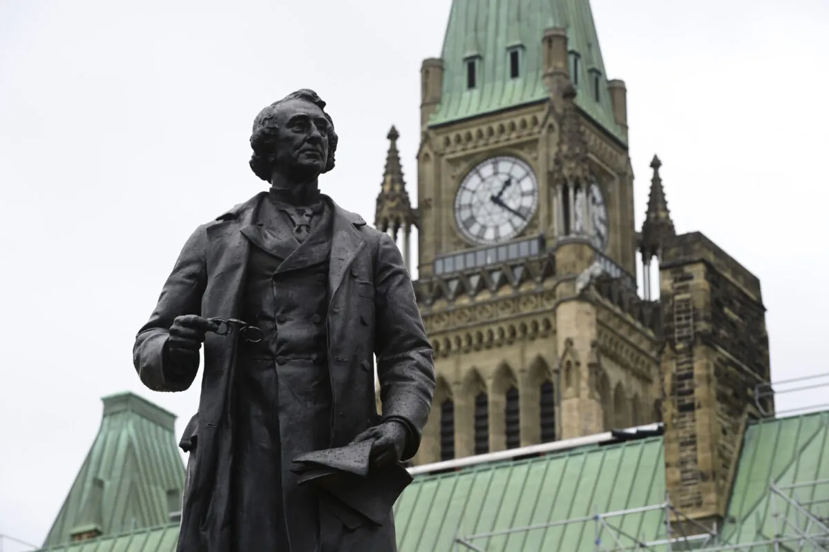 A statue of former Canadian Prime Minister Sir John A. Macdonald is pictured on Parliament Hill in Ottawa in a file photo. (The Canadian Press/Sean Kilpatrick)