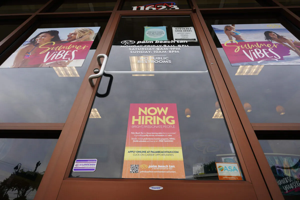 A Now Hiring sign is seen at a business in Richmond, Va., on June 2, 2021. (Steve Helber/AP Photo)