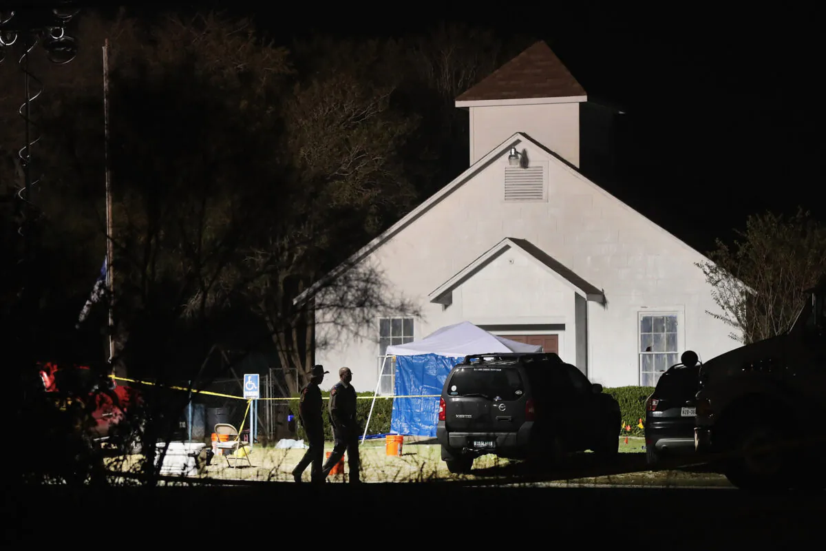 Law enforcement officials gather evidence after a mass shooting at First Baptist Church of Sutherland Springs in Sutherland Springs, Texas on Nov. 6, 2017. (Scott Olson/Getty Images)