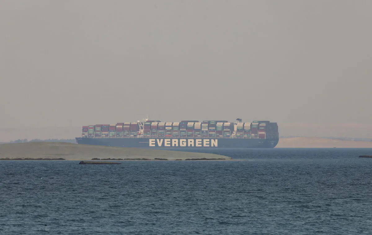The Ever Given, a Panama-flagged cargo ship, is seen in Egypt's Great Bitter Lake, on March 30, 2021. (Mohamed Elshahed/AP Photo)