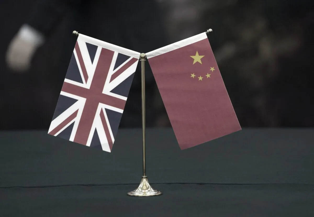 The union flag and the flag of the People's Republic of China, on March 2, 2015. (Arthur Edwards/The Sun/PA Media)