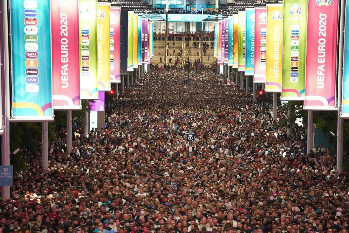 England fans leave Wembley Stadium along Wembley Way after England qualified for the Euro 2020 final, in London, on July 7, 2021. (Zac Goodwin/PA)