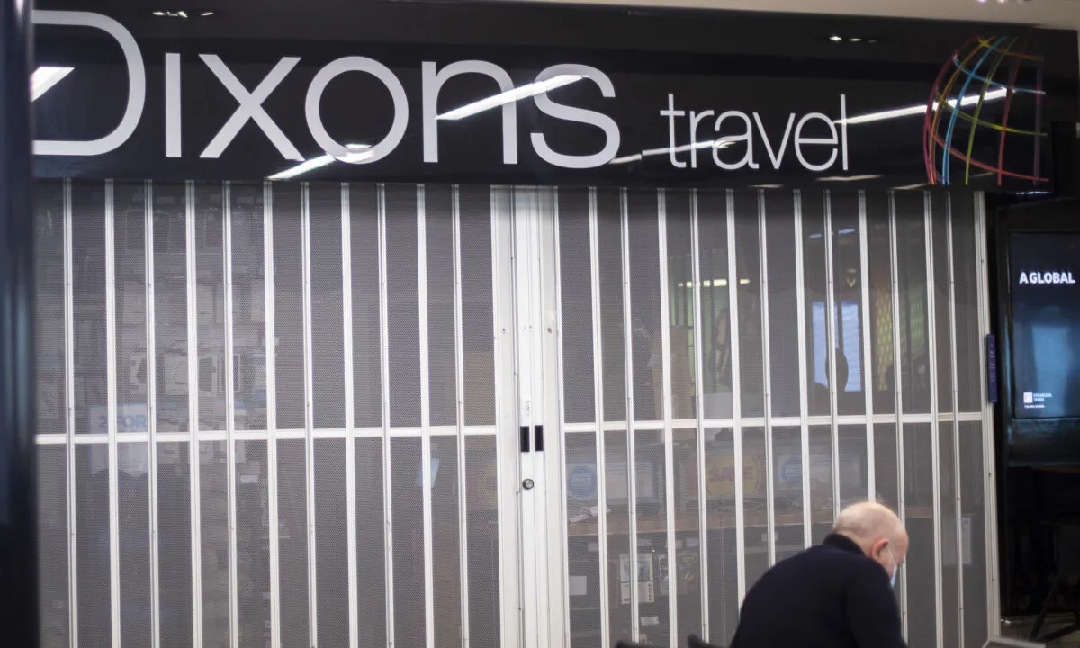 A Dixons Travel store with its shutters down at London City Airport on April 29, 2021. (Victoria Jones/PA)