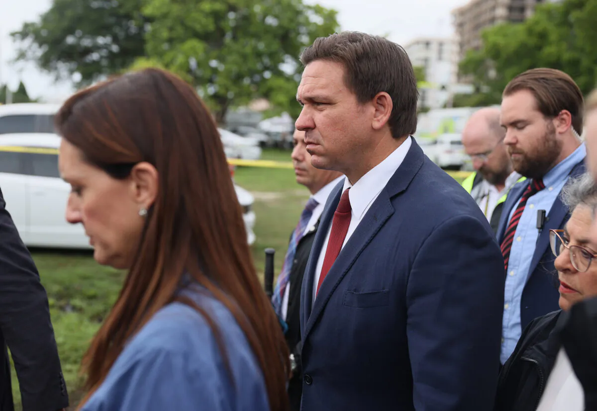 Florida Gov. Ron DeSantis arrives to address the media about the 12-story condo tower that partially collapse in Surfside, Fla., on June 24, 2021. (Joe Raedle/Getty Images)