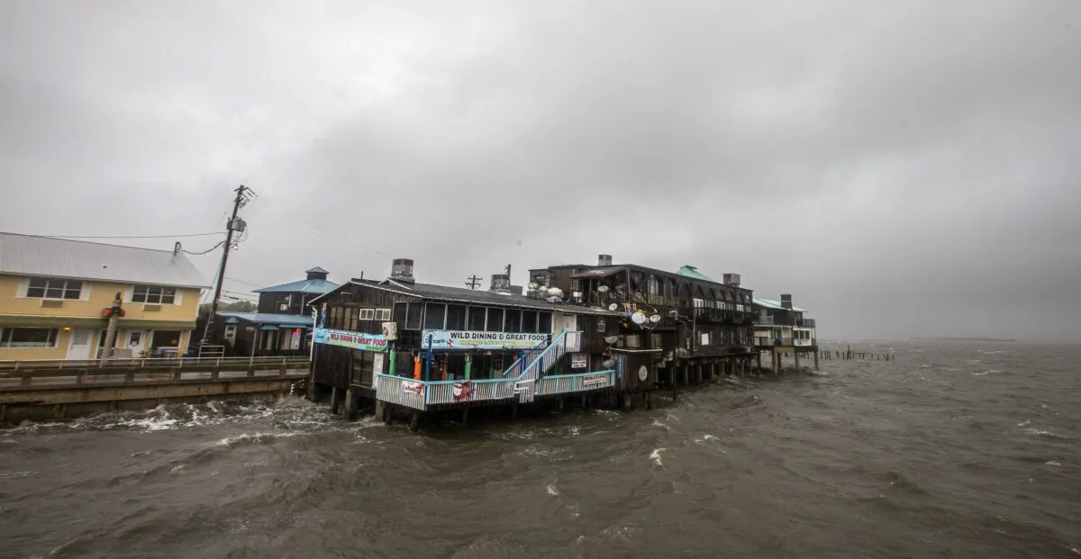 Bars and restaurants hang over the water as Tropical Storm Elsa makes landfall in Cedar Key, Fla., on July 7, 2021. (Mark Wallheiser/Getty Images)