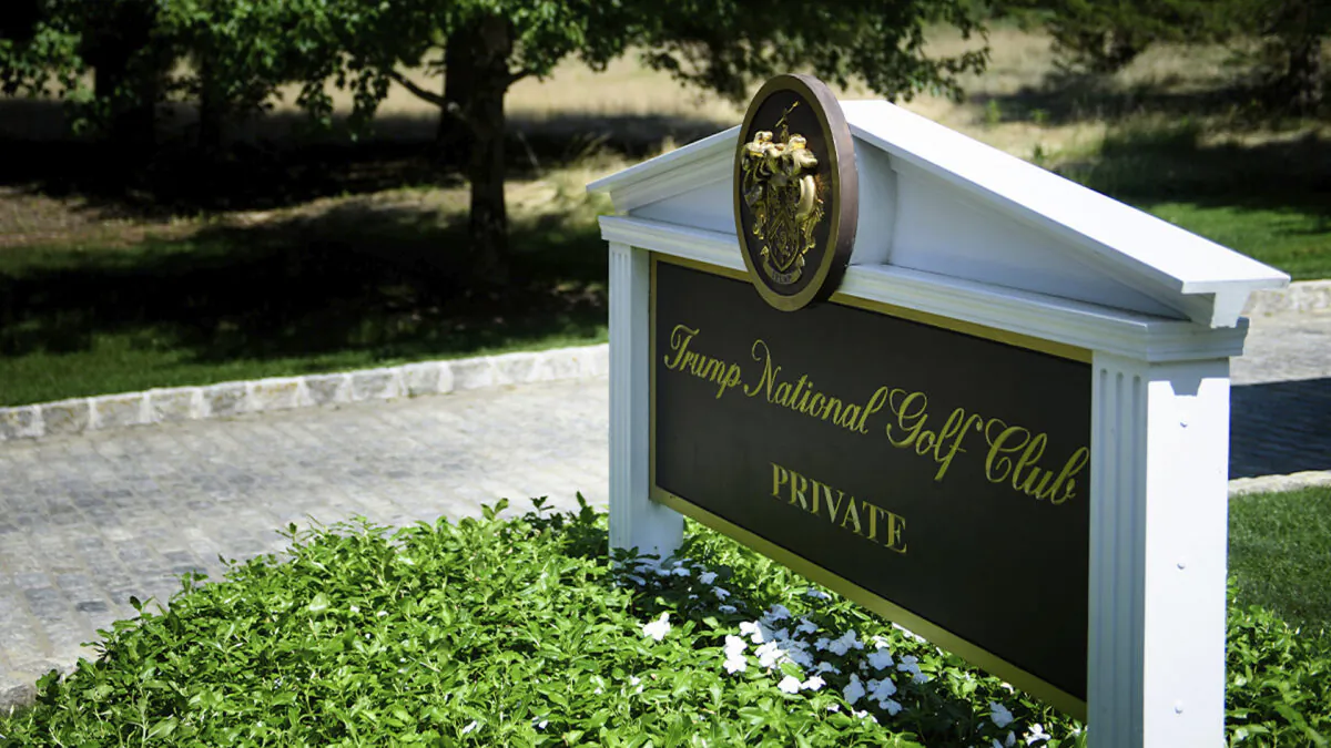 A sign is seen at an entrance to the Trump National Golf Club in Bedminster, New Jersey on Aug. 9, 2018. (Brendan Smialowski/AFP/Getty Images)