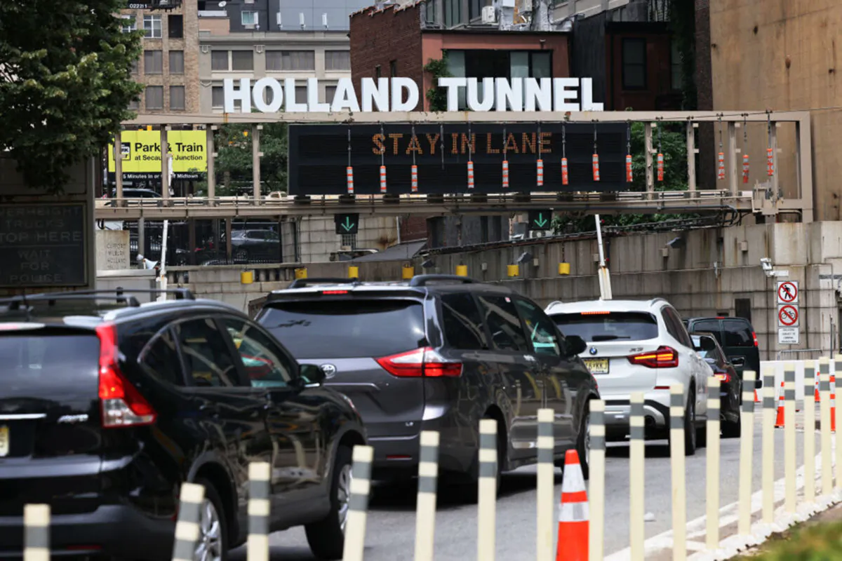 Vehicles wait in traffic to enter Holland Tunnel in Lower Manhattan, New York City on July 2, 2021. (Michael M. Santiago/Getty Images)