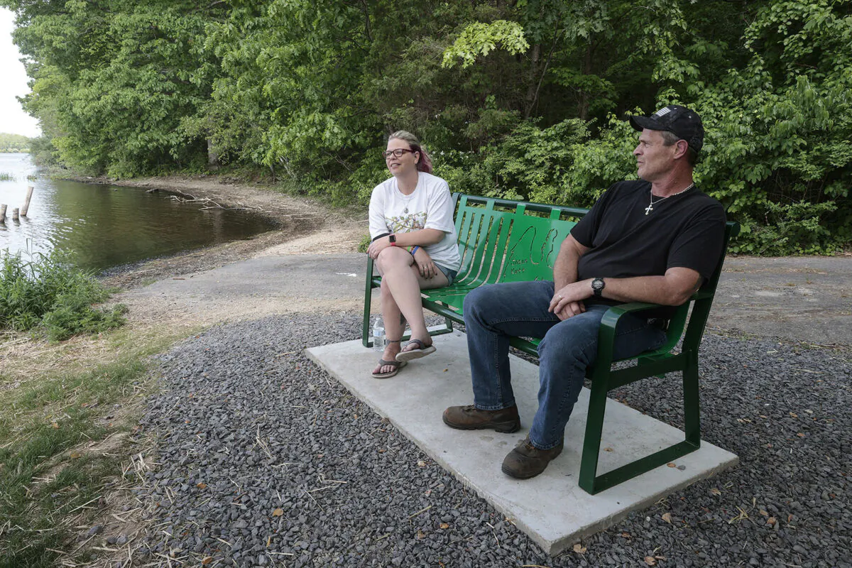 Dana and Ron Kutt dedicated a bench to their son, Jason, at the site of his death near Lake Nockamixon. (Steven M. Falk/The Philadelphia Inquirer/TNS)
