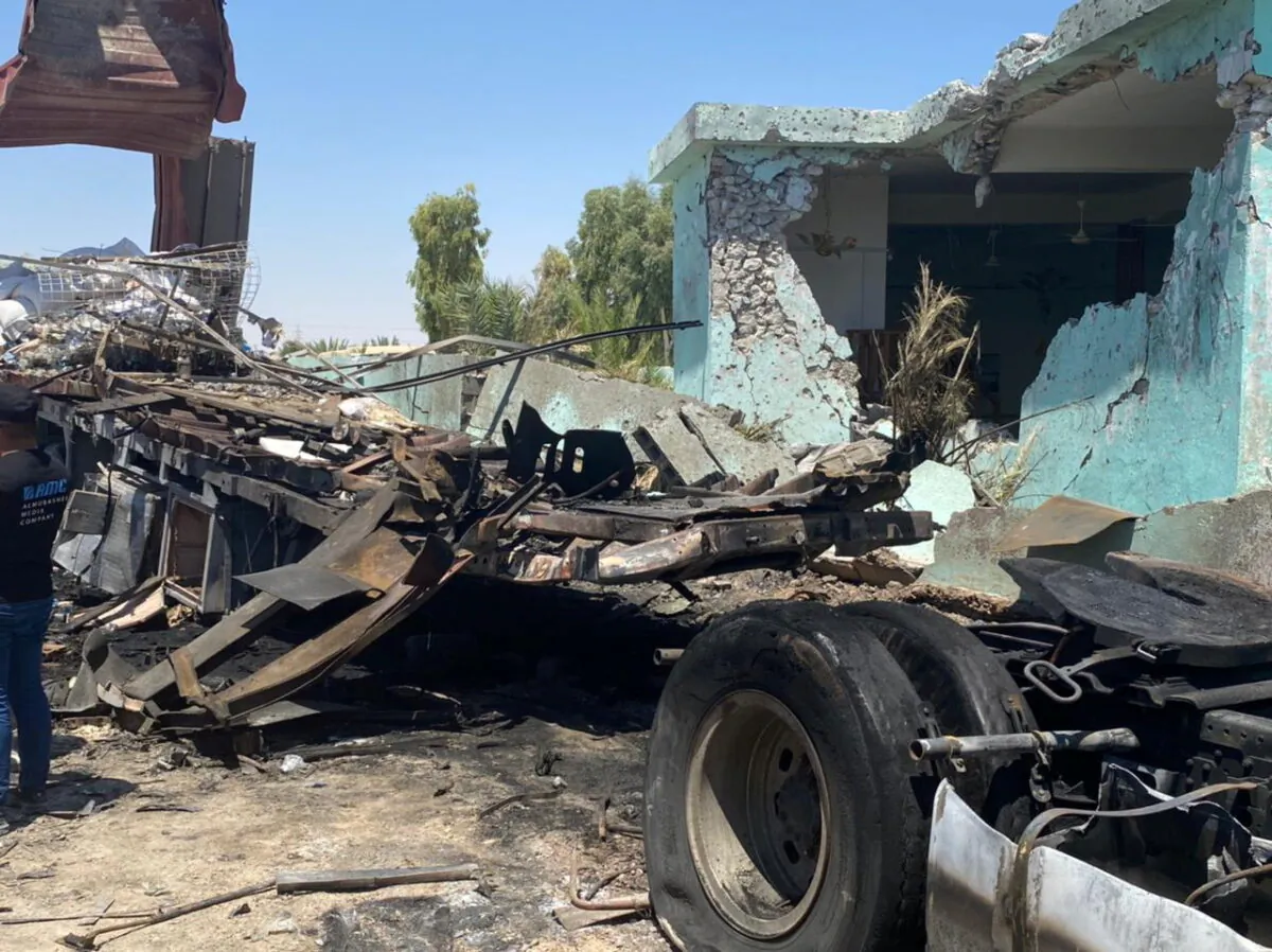 A truck from which rockets were launched towards Ain Al-Asad Military Base is seen at Anbar province, in al-Baghdadi, Iraq, on July 8, 2021. (Joint Operations Command Media Office/Handout via Reuters)