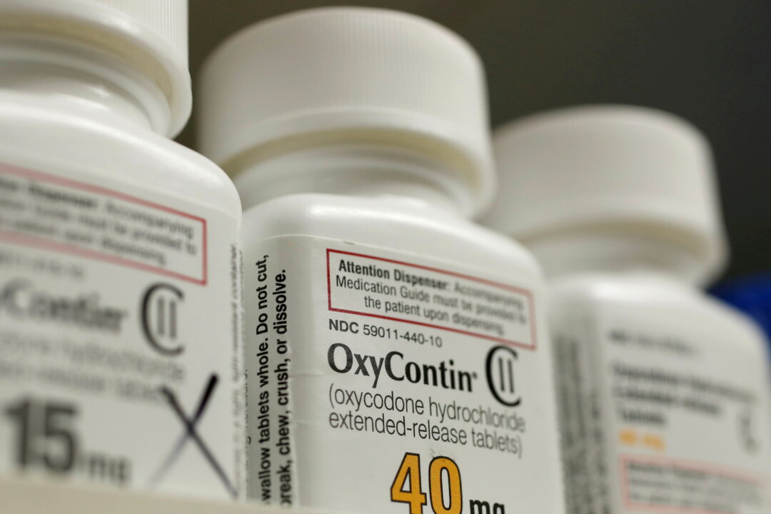 Bottles of prescription painkiller OxyContin, made by Purdue Pharma LD, sit on a shelf at a local pharmacy in Provo, Utah, on April 25, 2017. (George Frey/Reuters)