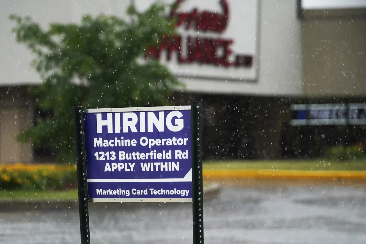 A hiring sign is displayed in Downers Grove, Ill., on June 24, 2021. (Nam Y. Huh/AP Photo)