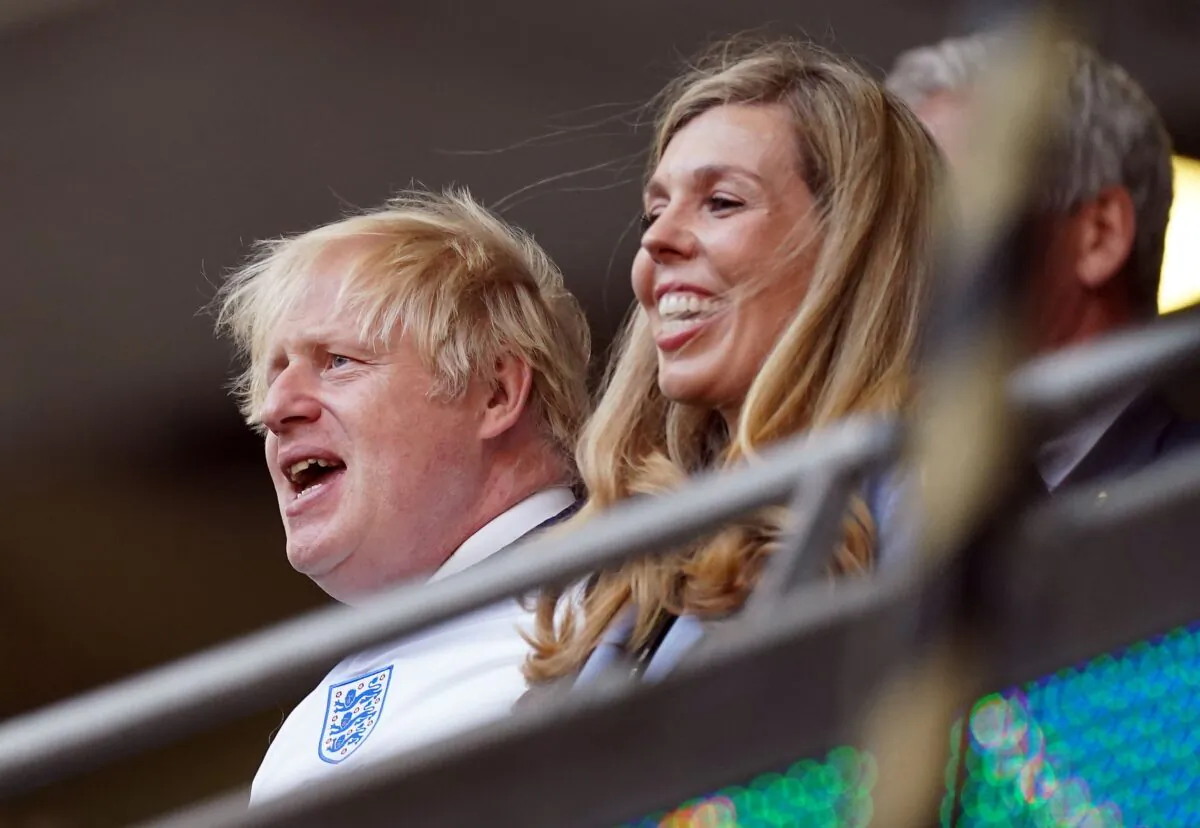 Prime minister Boris Johnson and Carrie Johnson in the stands during the UEFA Euro 2020 semi final match at Wembley Stadium, London, on July 7, 2021. (Mike Egerton/PA)