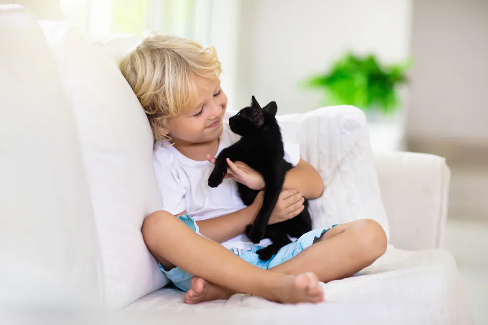 Recent studies have shown that pets inside the home protect children from allergies, and the protection increases with the number of pets. (FamVeld/Shutterstock)