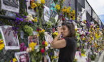 Families, Rescuers Hold Vigil Near Collapsed Building