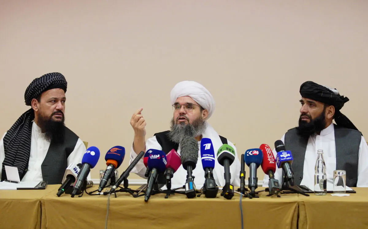 Members of Taliban political office Abdul Latif Mansoor (L), Shahabuddin Delawar (C) and Suhail Shaheen attend a news conference in Moscow, Russia, on July 9, 2021. (Tatyana Makeyeva/Reuters)