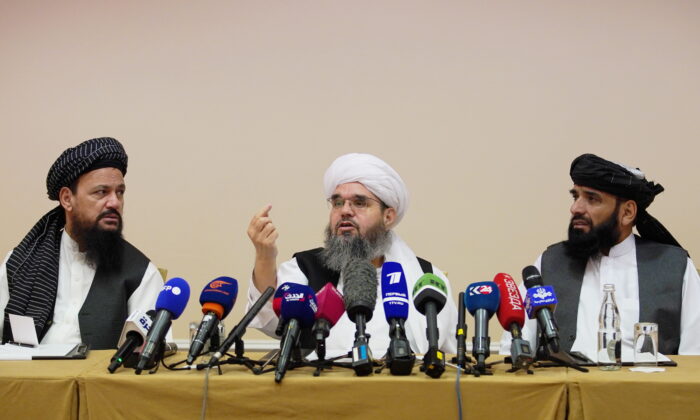 Members of Taliban political office Abdul Latif Mansoor (L), Shahabuddin Delawar (C) and Suhail Shaheen attend a news conference in Moscow, Russia, on July 9, 2021. (Tatyana Makeyeva/Reuters)