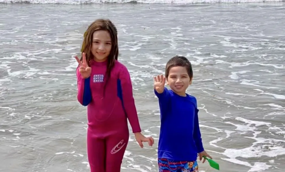 Mia and Tyler enjoy the beach. (Karen Brazas)