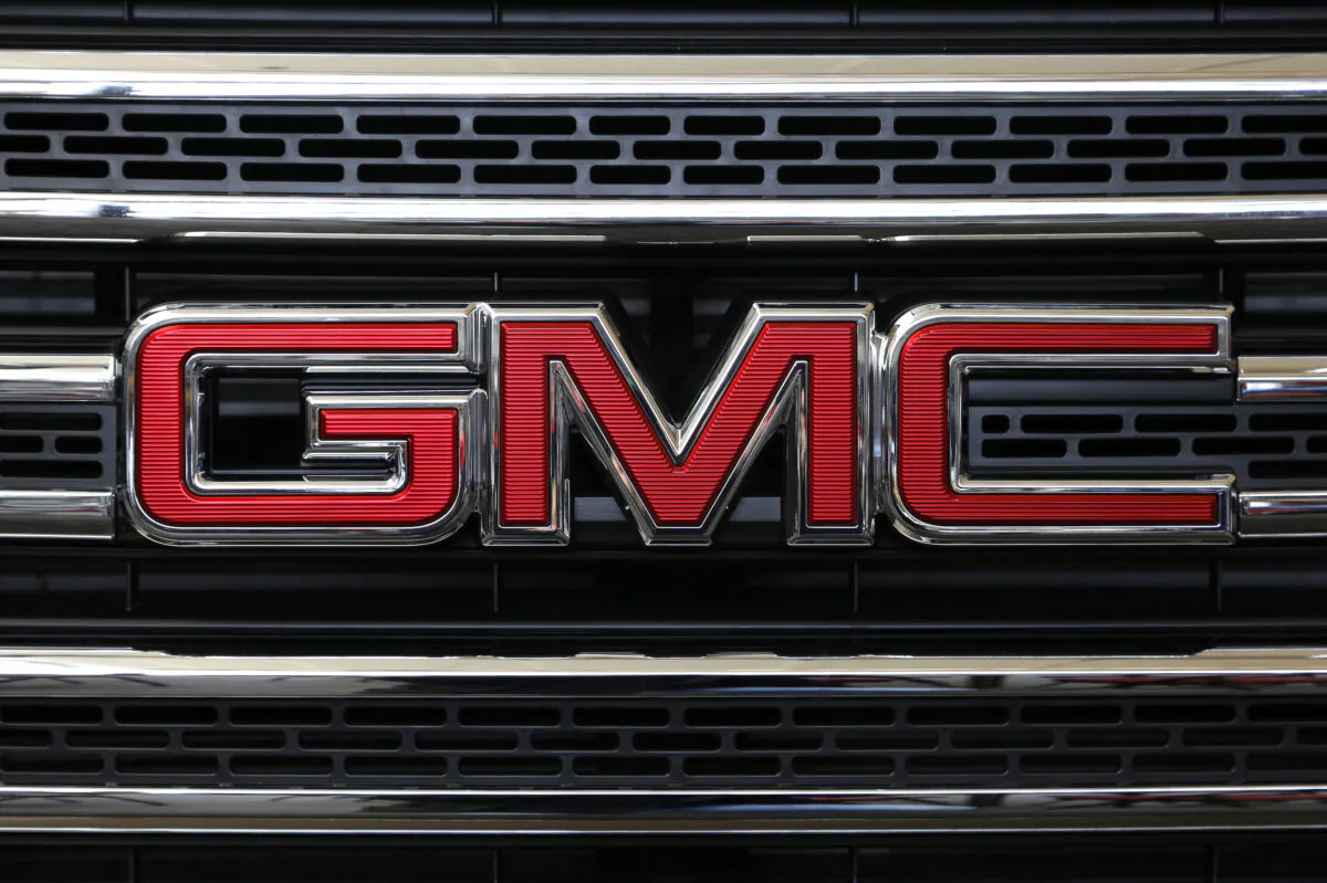 GMC logo on grill of a 2016 GMC Canyon on display at the Pittsburgh International Auto Show in Pittsburgh Thursday, Feb. 11, 2016. (AP Photo/Gene J. Puskar)