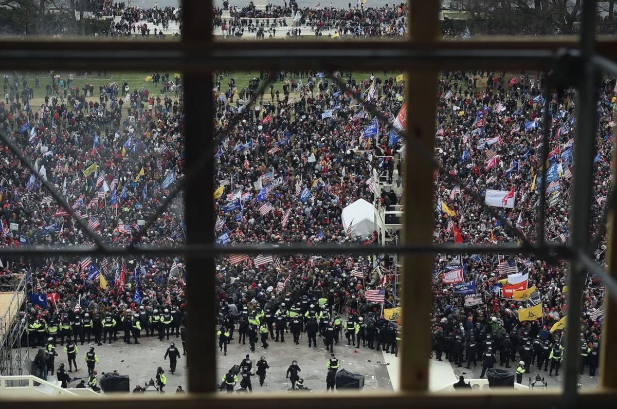 Police and protesters outside the U.S. Capitol's Rotunda in Washington on Jan. 6, 2021. (Olivier Douliery/AFP via Getty Images)